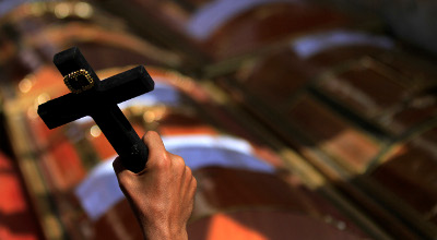 Coffins carry slain Coptic Christians in Egypt.