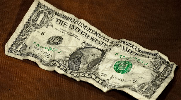 crumpled dollar bill