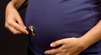 pregnant belly and stethoscope