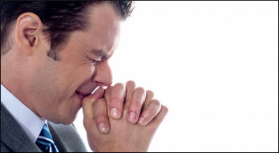 businessman praying