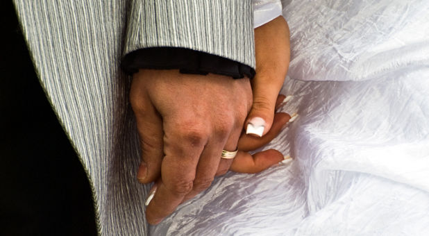 ethnic bride and groom on wedding day