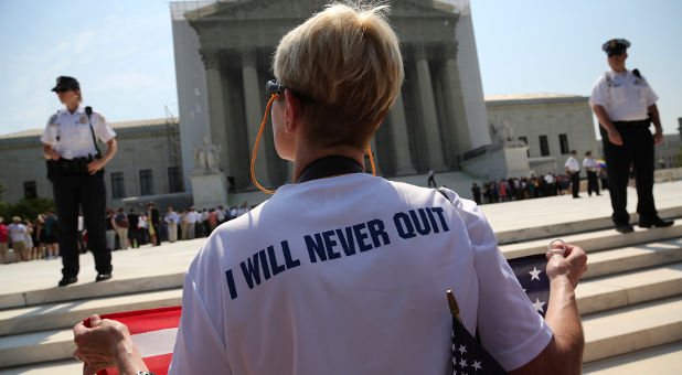 gay marriage supporter in front of Supreme Court