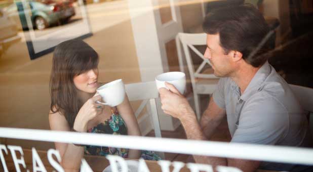 Man and woman enjoying coffee