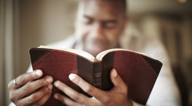 man reading bible