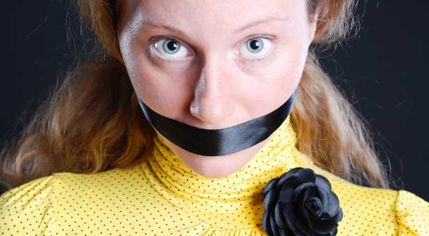 woman with mouth taped shut