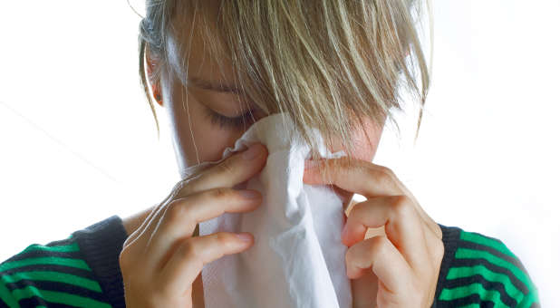 girl sneezing