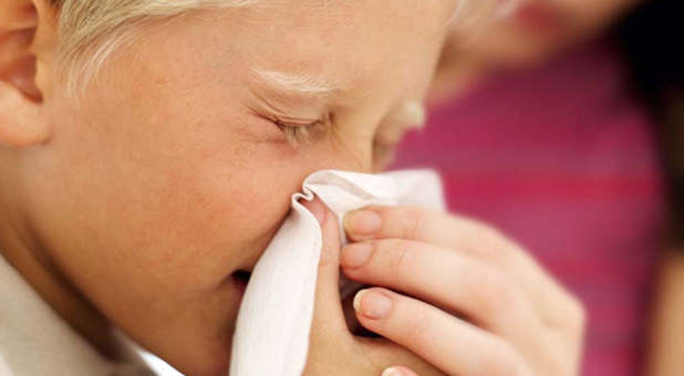 child sneezing