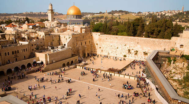 People gather at the Wailing Wall in Jerusalem to pray.