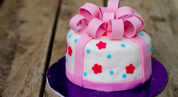 Pink cake with ribbons