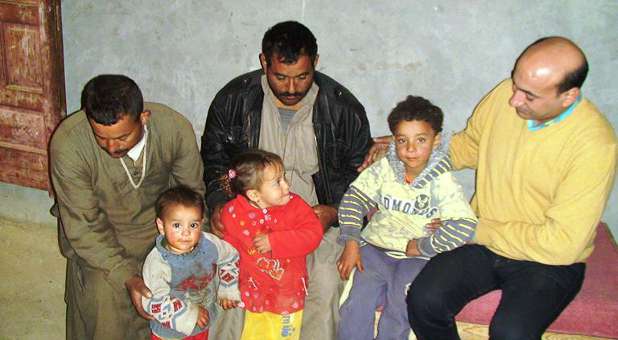 Coptic families in Upper Egypt's Minya province await news on their kidnapped relatives in Libya, January 2015.