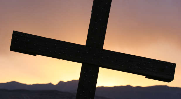 Cross mountains sunset