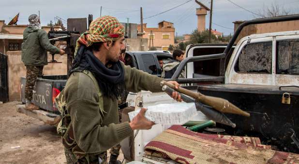 Kurdish fighters prepare to launch an offensive against the Islamic State after the kidnapping of hundreds of Christians.