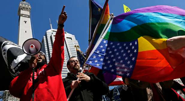 Demonstrators gather in Indiana to protest the Religious Freedom Restoration Act.