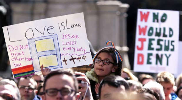 Demonstrators gather in Indiana to protest the Religious Freedom for Restoration Act.