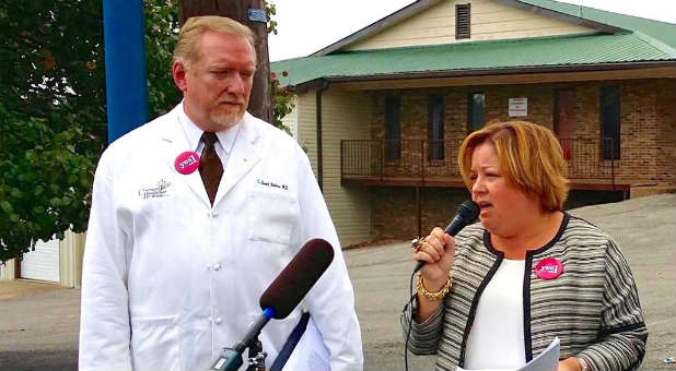 Brent Boles, left, is an OB-GYN