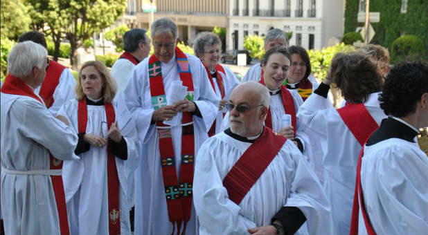 A group of Anglican priests. The Church of England may split over the issue of homosexuality.