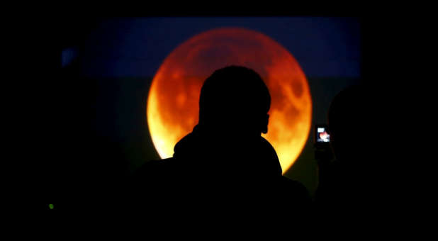 Observing Sunday night's blood moon, which some consider to be a sign of the times.