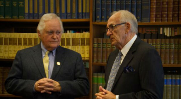 Bishop Sam N. Clements (right), general overseer of the Church of God of Prophecy, and Dr. R. Lamar Vest (left), president of Pentecostal Theological Seminary, sign a memorandum of understanding between the organizations.