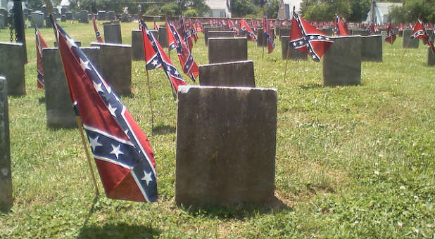 The flag became a flashpoint after the white man accused of carrying out the racially motivated church shootings was seen in photographs posing with the flag, which was used by the pro-slavery South during the U.S. Civil War.