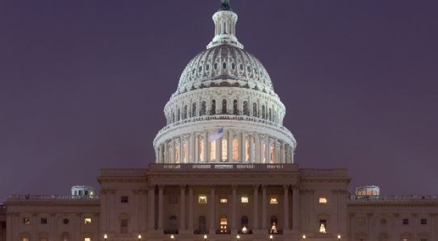 Ending weeks of infighting, the U.S. Congress on Wednesday voted to avert a government shutdown just hours before a midnight deadline, passing a stop-gap measure to extend funding for federal agencies until Dec. 11.