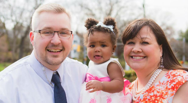 Erik and Nikki with their daughter Zoe