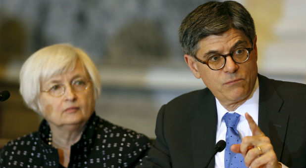 U.S. Treasury Secretary Jack Lew (right) delivers his remarks next to Federal Reserve Board Chair Janet Yellen (left) at the Oversight Committee hearing at the Treasury Department.