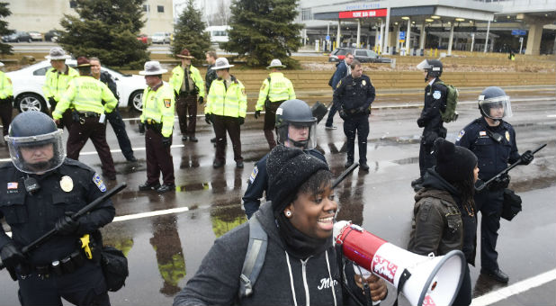 ‘Black Xmas’ Protests Erupt on Busiest Shopping Day of the Year