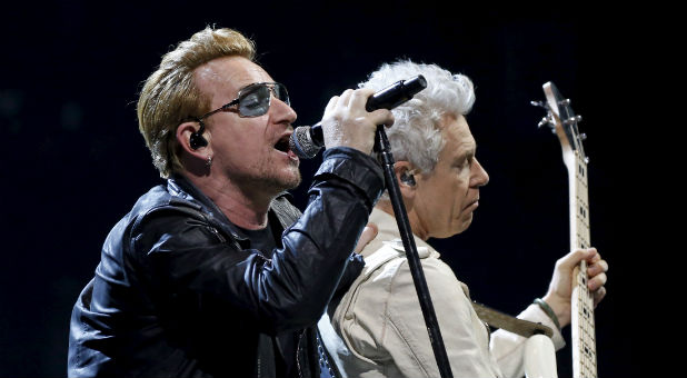 U2 Honors Victims of Terror at Paris Conference