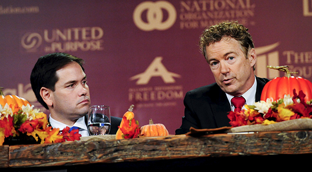 Marco Rubio and Rand Paul talking at the Presidential Family Forum