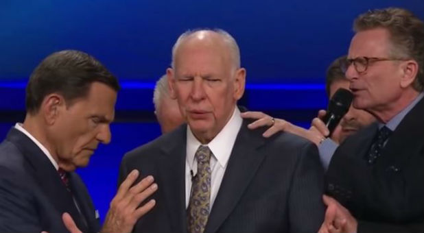 Kenneth Copeland lays hands on Rafael Cruz