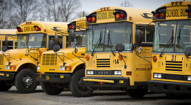 A building collapsed on a school bus mere moments after kids were dropped off.