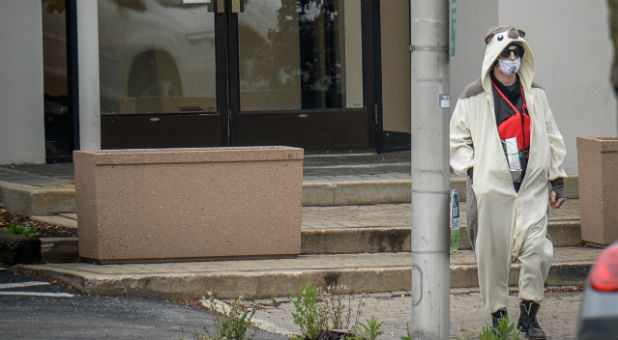 A man wearing a panda suit was shot by police.