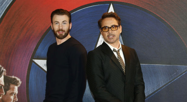 Actors Chris Evans (L), who plays