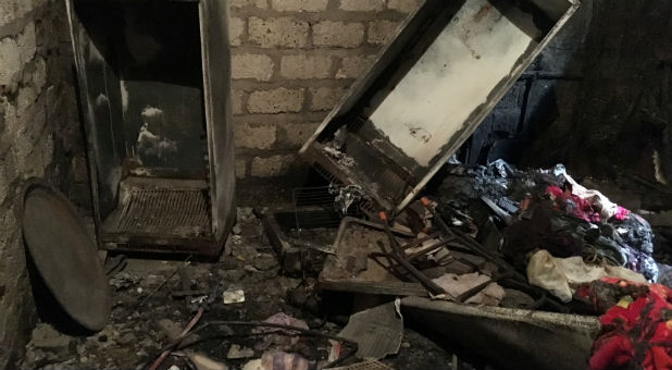 A damaged home belonging to one of seven Christian families, whose houses were looted and set on fire by Muslim men, is seen at Alkarm village in the southern province of Minya, Egypt.