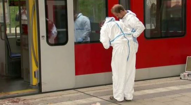 Investigators examine the scene of the attack.