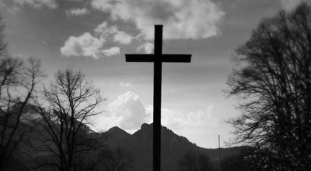 A Texas county agreed to remove crosses from police cars.