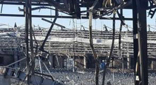 A cross remains in the rubble of the Jesus Dome.