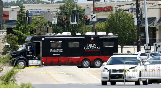 Billy Graham chaplaincy, emergency response vehicles are seen near the scene where police officers were shot in Baton Rouge.