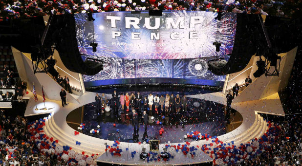 U.S. Republican Presidential Nominee Donald Trump and his family are joined by Vice-Presidential Nominee Indiana Governor Mike Pence and his family on stage at the Republican National Convention in Cleveland