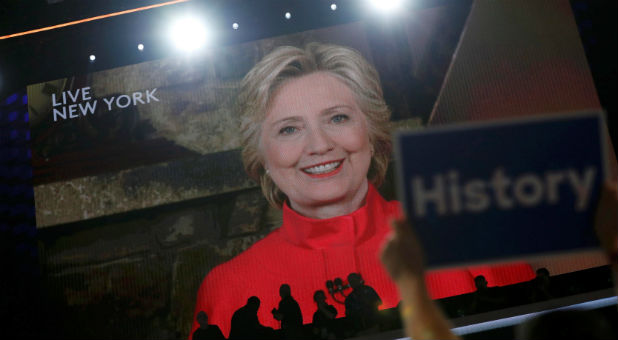 Democratic presidential nominee Hillary Clinton addresses the Democratic National Convention via a live video feed from New York during the second night at the Democratic National Convention in Philadelphia, Pennsylvania