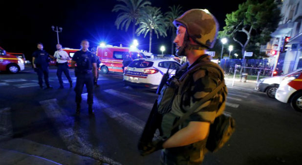 French soldiers cordon the area after at least 30 people were killed in Nice when a truck ran into a crowd celebrating the Bastille Day national holiday