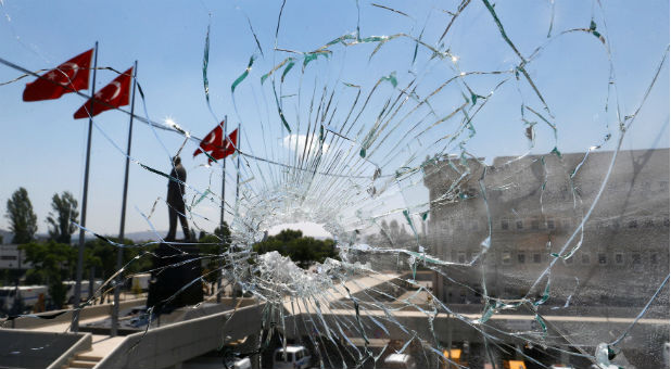 A damaged window is pictured at the police headquarters in Ankara, Turkey, July 18, 2016.