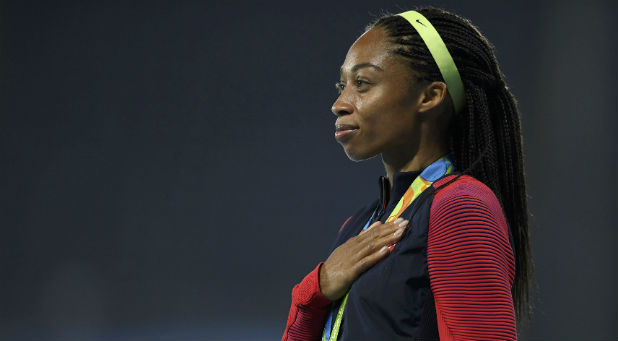 Allyson Felix (USA) of the U.S. celebrates winning gold.