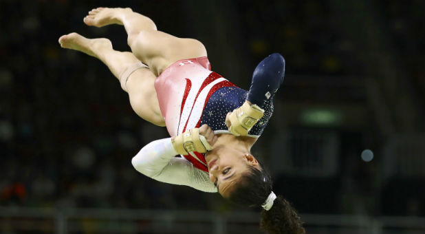 Laurie Hernandez (USA) of USA competes on the vault during the women's team final.