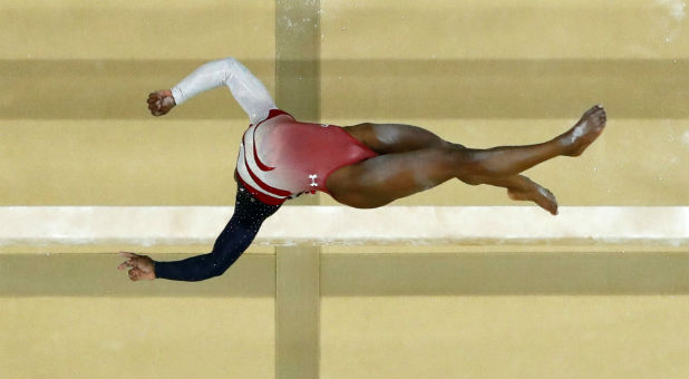 Simone Biles (USA) of the U.S. competes on the balance beam.