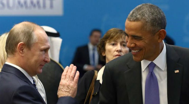 U.S. President Barack Obama (R) chats with Russia's President Vladimir Putin prior to a working session at the Group of 20 (G20) leaders summit in the Mediterranean resort city of Antalya, Turkey.