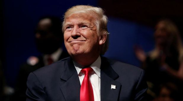 Republican presidential nominee Donald Trump is seen on stage during a campaign town hall meeting in Virginia Beach