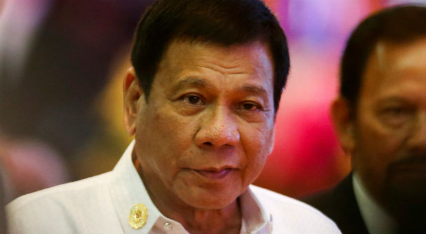 Philippines President Rodrigo Duterte leaves the opening ceremony of the ASEAN Summit in Vientiane, Laos