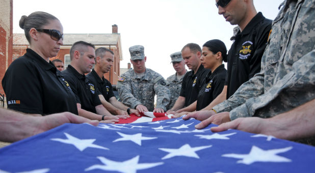 A patriotic, pre-game celebration honoring law enforcement and first responders at a high school football game has drawn the ire of the New Jersey chapter of the American Civil Liberties Union.