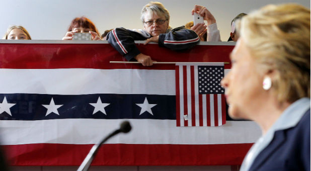 Audience members listen as U.S. Democratic presidential nominee Hillary Clinton delivers an economic speech during a campaign stop in Toledo